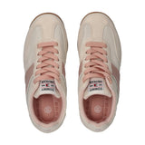 Off-white low-cut sneakers with pink laces, pink side stripes, a brown rubber sole, and Tommy Hilfiger logo on the tongue.