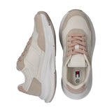 Pair of off-white and nude low-cut lace-up sneakers with light pink laces, mesh panels, and chunky white soles.