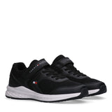 Pair of black low-cut sneakers with mesh upper, synthetic overlays, white midsole, black laces, and a black Velcro strap.