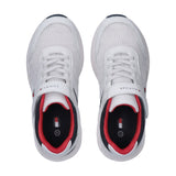 White mesh low-cut sneakers with white laces, velcro straps, and 'TOMMY HILFIGER' branding. Red and navy blue collar lining,