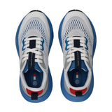 Pair of white mesh low-cut trainers with blue sculpted soles, white laces, blue and grey accents, and a red heel pull tab.