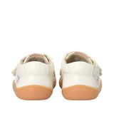 Off-white mid-cut sneakers with velcro straps, light brown soles, and pink interior. A pink heart is on the outer heel of eac