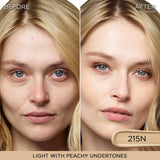 A creamy swatch of light beige liquid concealer, shade 215N, with peachy undertones.