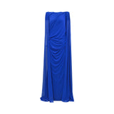 Royal blue long dress with a draped, ruched bodice and a flowing, sheer cape overlay extending from the shoulders.