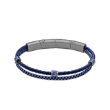 Two-strand bracelet: braided black/blue leather and blue cord with silver-toned beads. Gunmetal-toned clasp, blue rings, and