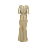 Rear view of the gold Talbot Runhof gown showing the V-shaped back, center zipper closure, and elegant ruching that flows into a floor-length hem.