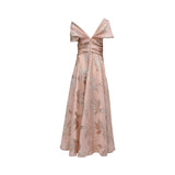 Back view of a TALBOT RUNHOF floral jacquard gown showing the elegant V-shaped back neckline and the fluid A-line drape of the floor-length skirt.