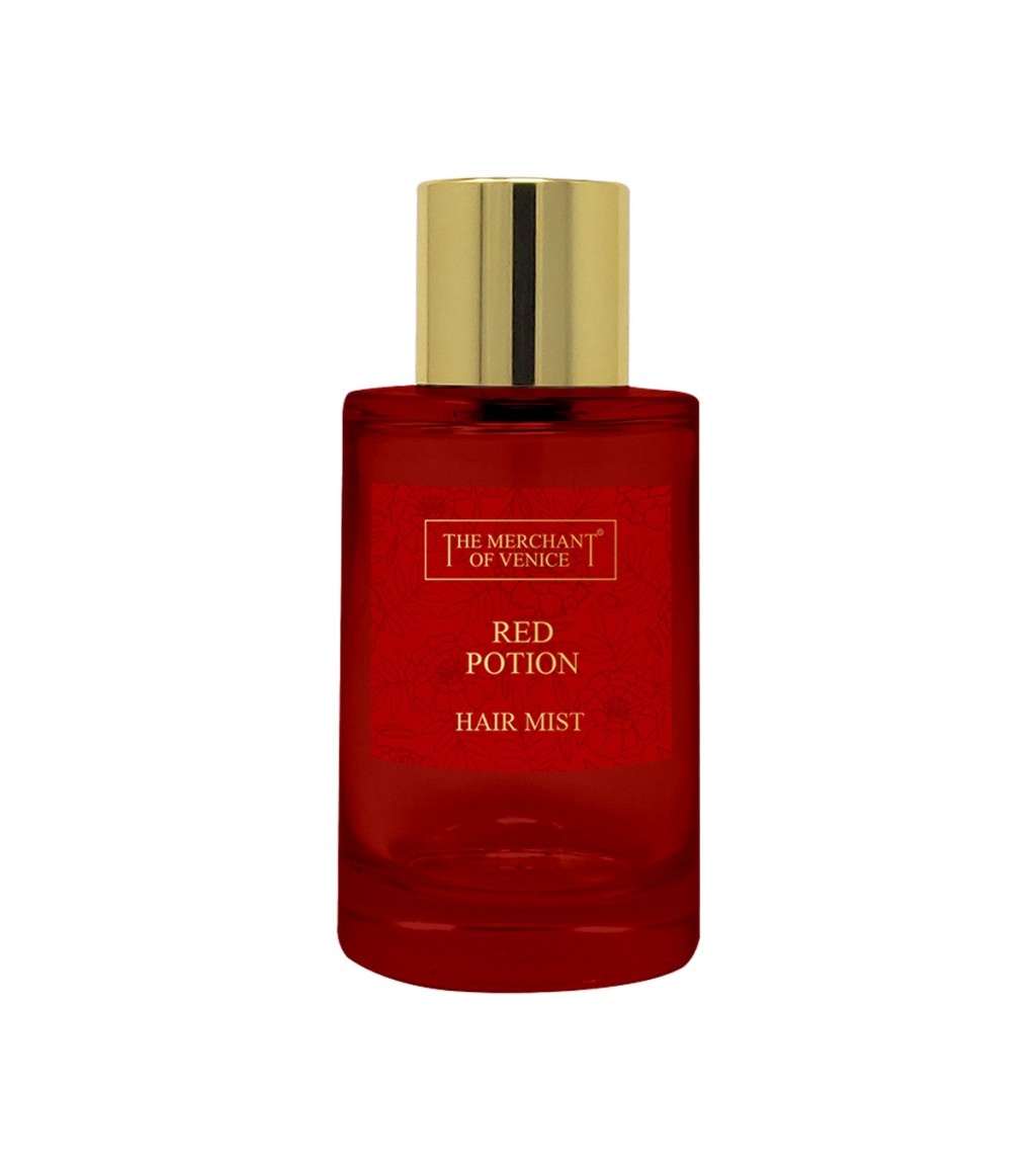 The Merchant Of Venice Red Potion Hair Mist - 100ml Red potion hair mist bottle with gold cap on a white background