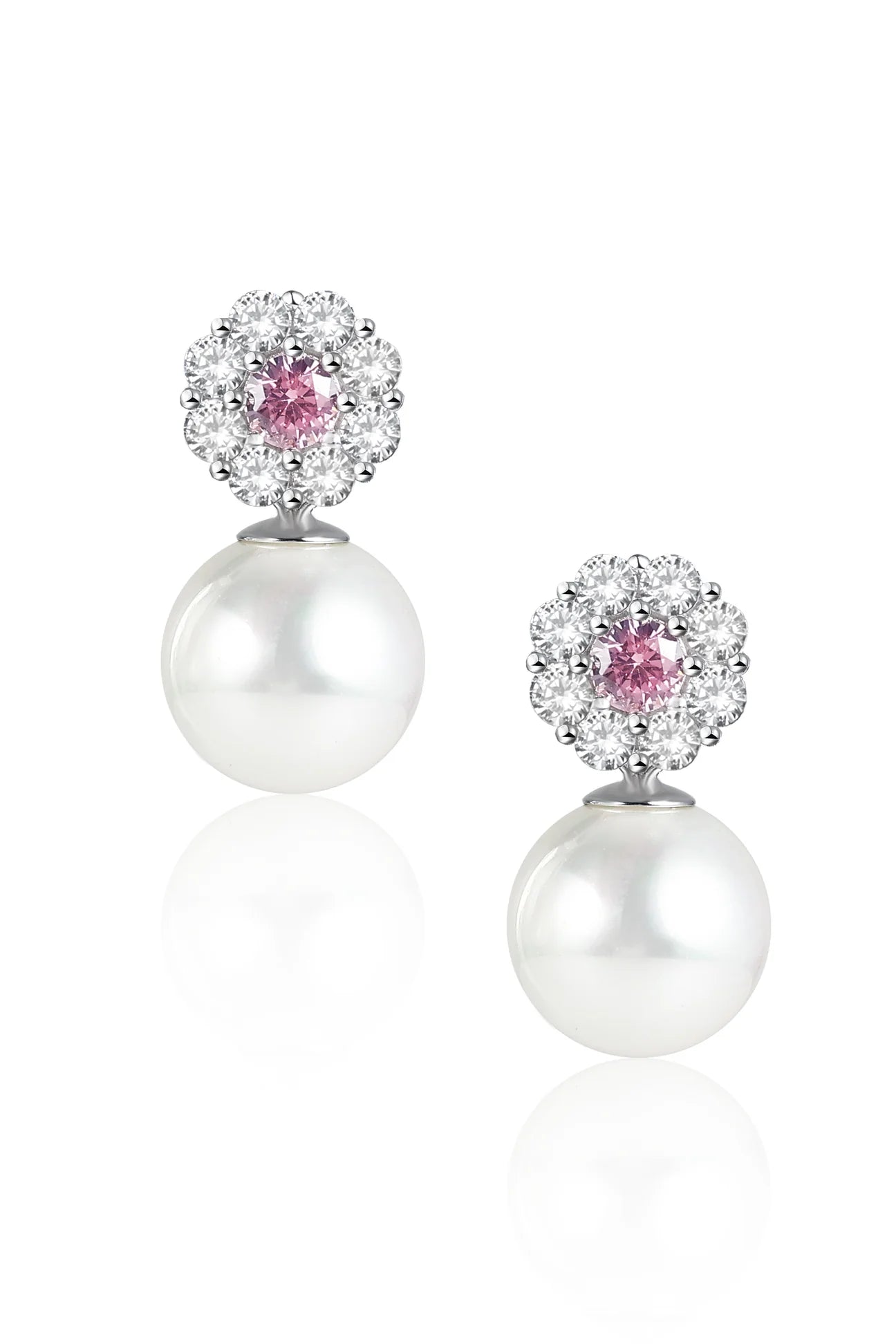 Silver-toned drop earrings with a floral stud featuring a pink central crystal and clear crystals, suspending a white pearl.
