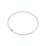 A three-quarter studio layout view of the Swarovski Matrix tennis necklace, emphasizing the uniform alignment and individual prong settings along the flexible rose gold-finished strand.