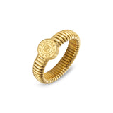 A three-quarter perspective studio shot of the size 52 coin motif ring, showcasing the polished thickness of the central disk and the tactile dimension of the gold Tubogas coils.