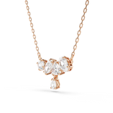 A three-quarter perspective studio shot of the Swarovski Mesmera necklace, demonstrating the dimensional depth of the mixed-cut crystals held by delicate rose gold-plated prongs.