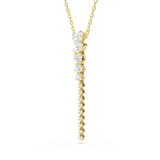 A three-quarter perspective studio view of the Swarovski Mesmera Y necklace, demonstrating the dimensional layering and transition of the multi-cut clear crystals and the warm golden prongs.