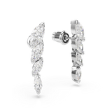 A three-quarter studio perspective of the Swarovski Mesmera drop earrings, illustrating the thickness of the rhodium settings and the secure push-back closure mechanism.