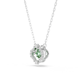 A three-quarter perspective studio view of the Swarovski Una Angelic pendant, illustrating the structural depth of the setting and the secondary clear square crystals anchoring the top and bottom of the clover motif.