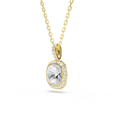 A three-quarter studio perspective view of the Swarovski Una Angelic pendant, highlighting the depth of the cushion-cut crystal, the gold setting walls, and the pavé-set bail.