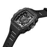 A high-angle studio photograph of the Cerruti 1881 Gubbio watch, highlighting the side profile of the brushed black steel case, the knurled gear crown, and the deep grooved channels on the black silicone strap.