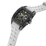 A high-angle studio photograph of the Cerruti 1881 Belluno watch, emphasizing the depth of the sculpted black case, the hollow lug cutouts, the gear-style crown, and the texture of the white silicone strap.