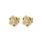 A three-quarter perspective studio shot of the gold-plated flower stud earrings turned slightly to the right, showing the layered dimension of the petals and the attached butterfly ear backing.