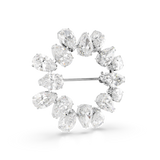 A three-quarter studio perspective view looking from the right side of the Swarovski Matrix brooch, emphasizing the dimensional layering of the prong-set pear crystals and their faceted light reflection.
