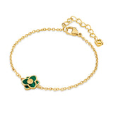 A three-quarter perspective studio shot of the Saint Honoré Burj gold-plated chain bracelet on a clean white surface, highlighting the layered green malachite flower motif, lobster clasp, and SH logo charm.