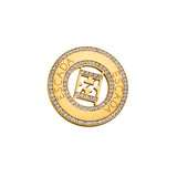 A three-quarter angle product shot of the Escada Alice brooch, showcasing the dimensional depth of the openwork center, the texture of the handset crystals, and the brilliant reflections along the polished gold surface.