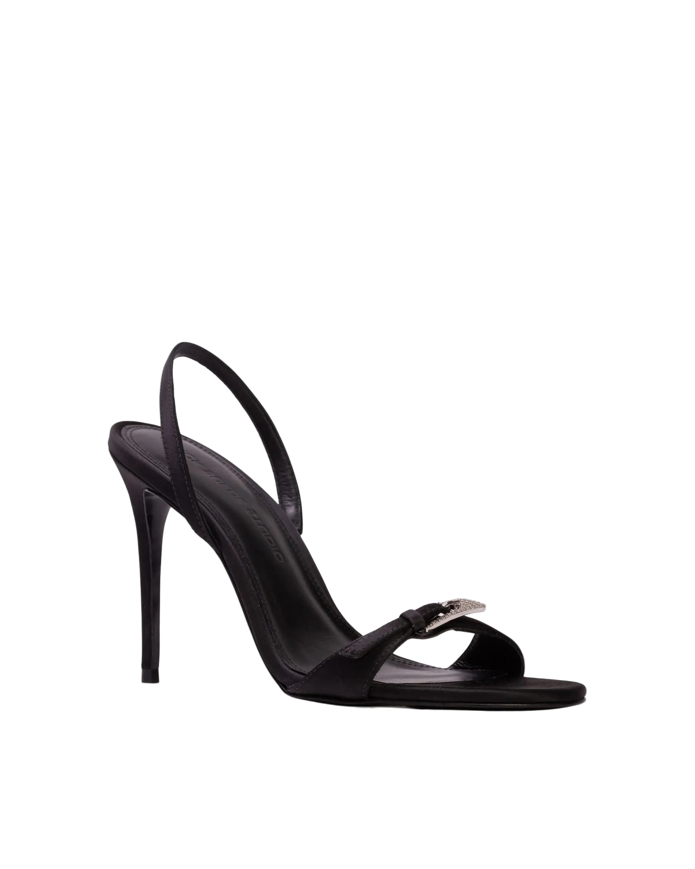 Three-quarter view of a black satin evening sandal by Black Suede Studio against a light grey background, highlighting the elegant slingback silhouette.
