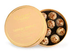 Tiramisu truffles in a gold tin with Charbonnel et Walker branding 