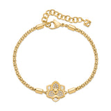 A top-down circular display of the Burj flower bracelet, showcasing the woven popcorn chain structure, lobster clasp closing mechanism, and adjustable extension links with the SH logo charm.