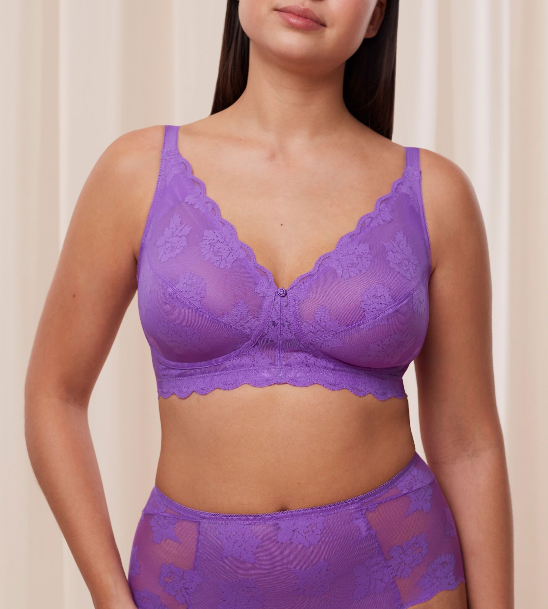 Triumph Amourette 300 Summer non-wired bra in purple front model view, featuring unpadded floral embroidery. Available Now