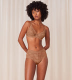 Triumph Amourette 300 maxi panty in Toast beige model full front view, with floral lace details and high-waist cut. Shop Now Online