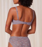 Triumph Amourette 300 wired bra in purple model back view, showing adjustable straps and featuring unpadded floral lace cups and supportive underwiring. Find Online Today