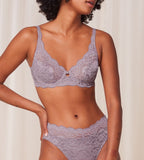 Triumph Amourette 300 wired bra in purple model front view, featuring unpadded floral lace cups and supportive underwiring. Find Online Today