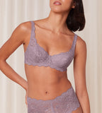 Triumph Amourette 300 wired padded bra in purple model front view, showcasing the floral lace overlay. Shop Online Today