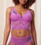 Triumph Amourette Charm Summer longline bustier in Pink second model front view, showcasing the floral lace and extended under-bust band. Available Online at Blue Salon Qatar