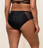 Triumph Amourette Charm maxi panties in black second model back view, showing the floral lace design and smooth back. Shop Now Online