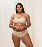 Triumph Amourette Charm maxi panties in light beige second model full front view, showing the high-waist lace front and smooth microfiber back. Order Online Today
