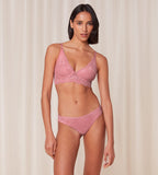 Triumph Amourette Charm non-wired bra in pink model full front view, showcasing the floral lace cups and comfortable wire-free design. Available for Online Purchase