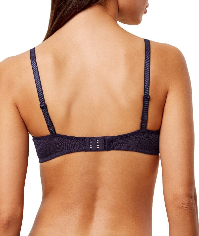 Triumph Amourette Charm wired padded bra in navy blue model back view, showing adjustable straps. Available at Blue Salon Qatar