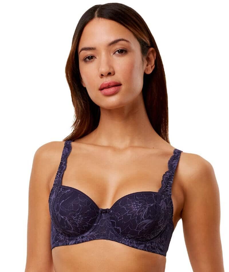 Triumph Amourette Charm wired padded bra in navy blue model front view, showing the lace-covered cups and supportive underwired design. Available at Blue Salon Qatar