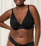 Triumph Aura Spotlight black wired padded bra second model front view, showcasing the lace-covered cups and supportive underwire. Shop Online