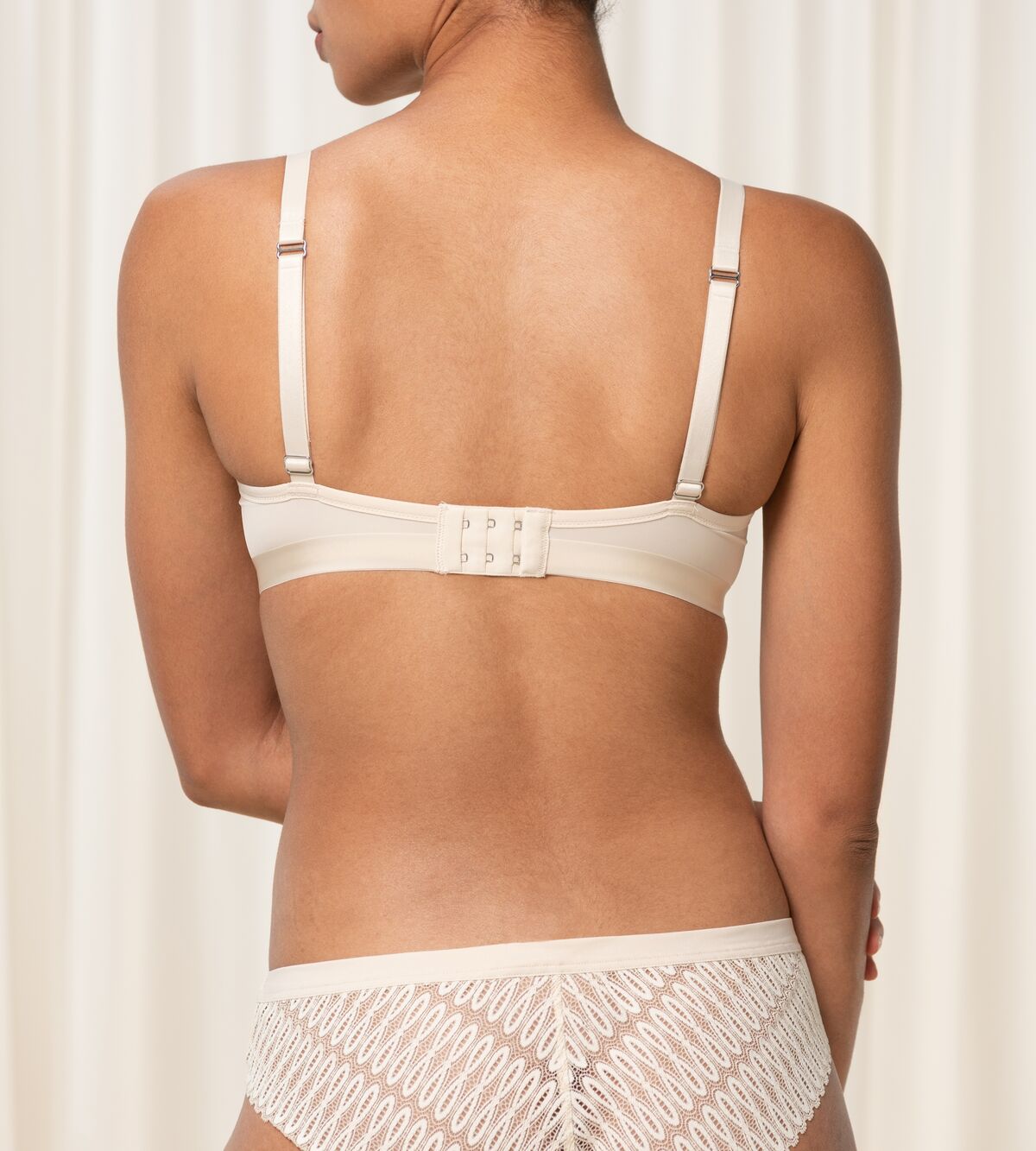 Triumph Aura Spotlight light beige  wired push-up bra model back view, showing adjustable straps. Available Online Today.