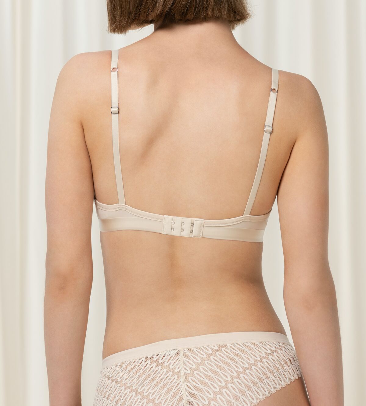 Triumph Aura Spotlight light beige  wired push-up bra second model back view, showing adjustable straps. Available Online Today.