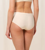 Triumph Aura Spotlight maxi panty in light beige model back view, showing the high-waist design and decorative side lace. Now Available Online