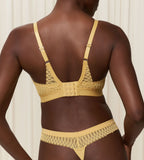 Triumph Aura Spotlight non-wired bra in yellow model back view, showcasing adjustable straps with the vibrant floral lace and supportive wireless design. Shop the Latest Online