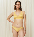 Triumph Aura Spotlight non-wired bra in yellow second model full front view, showcasing the vibrant floral lace and supportive wireless design. Shop the Latest Online