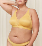 Triumph Aura Spotlight non-wired bra in yellow third model front view, showcasing the vibrant floral lace and supportive wireless design. Shop the Latest Online