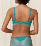 Triumph Aura Spotlight wired bra in green second model back view, showcasing adjustable straps and the graphic lace design. Shop Online Today