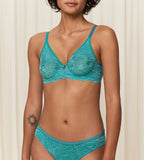 Triumph Aura Spotlight wired bra in green second model front view, showcasing the graphic lace cups and supportive underwired design. Shop Online Today