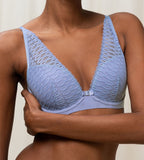 Triumph Aura Spotlight wired padded bra in Purple Dust model close-up view, highlighting the lace-overlaid cups and comfortable underwire design. Shop the Latest Online.